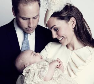 Prince George grins at Kate Middleton in a new christening portrait.jpg